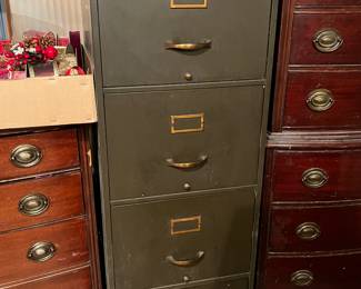 Metal file cabinet (filled with ribbons)
