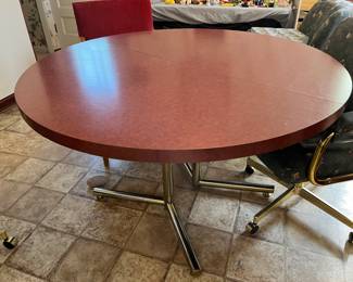 Round Formica table with leaf....