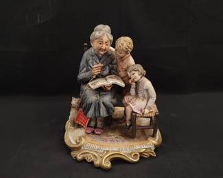 Capodimonte Porcelain Figure with original tags.