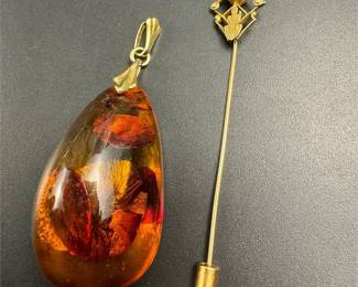 14k gold large amber pendant and 10k vintage stick