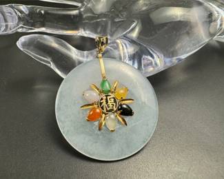 14k gold jade disk pendant with multicolored gemstones 