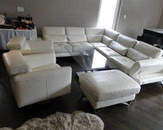 CalItalia Leather sectional - Adjustable seats to rest downward, ottoman, two swivel chairs