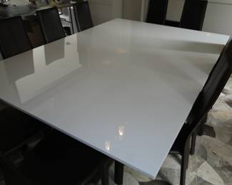 Custom made white glass dining room table and 10 chairs
