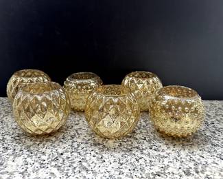 Votives in gold glass