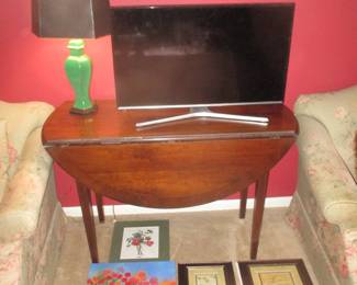 drop leaf table, television and home decor