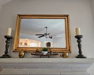 large mirror with mantel decor