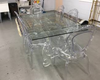 Glass top table with Acrylic chairs