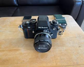 Nikon F3 35mm camera with 35mm lens. Works great!
