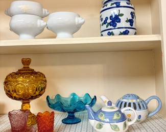 Top shelf - (3) set of Sur La Porcelain bowls, April Cornell cannister. Bottom shelf - Amber Glass Compote, MCM LE Smith Glass Pedestal bowl, Vintage Fenton Hobnail Orange Toothpick holder, Royal Norfolk Vintage Teapot.