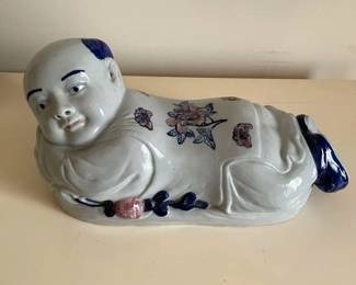 Asian Porcelain Character Laying Down