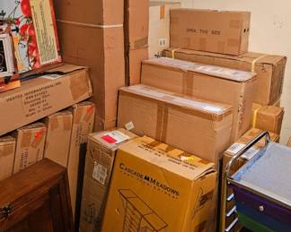 All brown boxes are new, opened by EDM Estate Sales