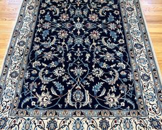 51” x 84.5” hand knotted persian rug
