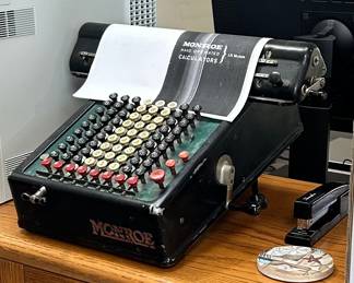 Antique manual calculator by Monroe with manual