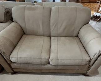 Leather love seat by Whittemore-Sherrill Limited