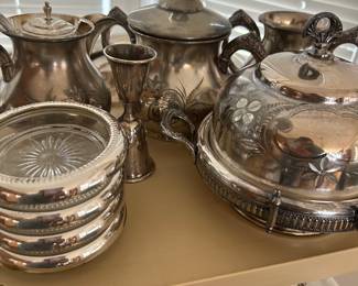 Silver plate serving pieces, tea sets, coasters
