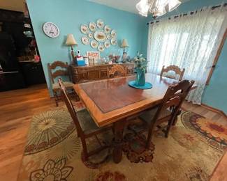 Beautiful Antique Table.  Perfect condition, matching chairs and buffet.