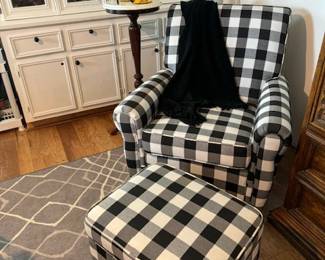 Buffalo Plaid Chair & Ottoman, black throw, marble top high standing table, black & yellow butterfly stilettos shoes.   Style...., ABSOLUTELY!