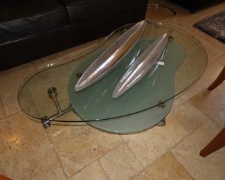 Rolling glass table