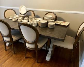 Dining table and six chairs in excellent condition!