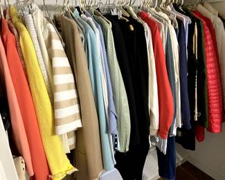 Closet full of women’s designer clothing (10-12).