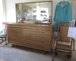 Brown Saltman John Keal dresser with mirror, antique rocking chairs, vintage coats and blouses