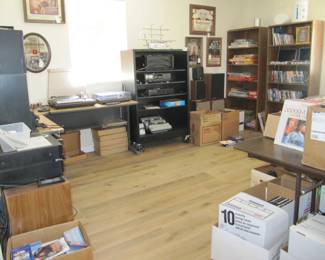 Studio is filled with electronics, movies, books, posters, beer mirrors and more!