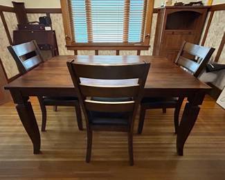 Farmhouse style expandable table with self-storing leaf (can seat up to 12) includes bench and 3 chairs