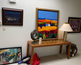 Teak TIle topped console, pair of brass cylinder lamps, Mobius Strip, Kevin Short fairgrounds at night painting, Didier Chretien painting, Weber Mobius strip sculpture,