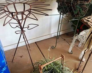 two vintage standing iron flower pots