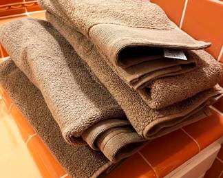 a collection of brand new towels