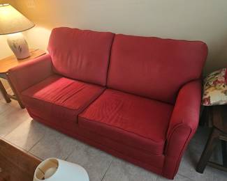 The photos from here on are for one of next weekends estate sale in Viera
Red Lazy boy sofabed mint condition 84" $300