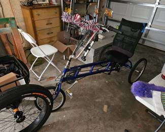 3 wheeled sit down bike 
$300.00 retails Over $1600.00. Back tires are flat