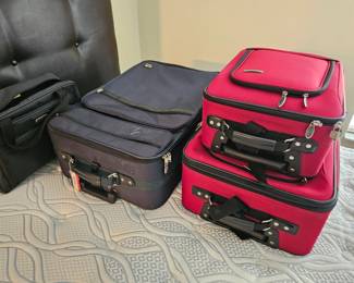 Two pieces red luggage set $40
Middle very large luggage $20