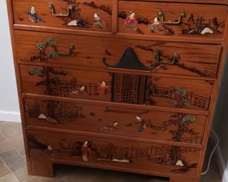 c. 1960 bureau hand-carved and inlaid with mother-of-pearl to from Japanese scenes. Bought around 1960 in Panama.