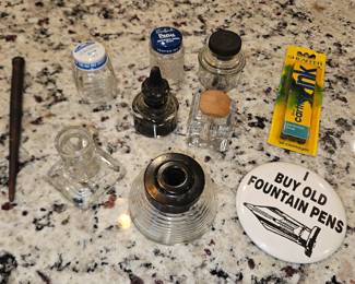 Sanford’s Glass Fountain Pen Ink Bottle, Higgins Black/Glass Inkwell, Preferred Products WWII Navy Glass Inkwell Toledo OH, Sanford’s Penit Washable Royal Blue Bottle, Carter’s Washable Blue Ink Bottle,
Vintage Ink Glass Bottle w/Carved Wood Cork Top, Etc!