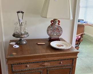 REPURPOSED ANTIQUE VICTROLA TO A STORAGE CABINET. ORIENTAL LAMP, VICTORIAN STYLE CASTOR CRUET SET, THERE ARE TWO  