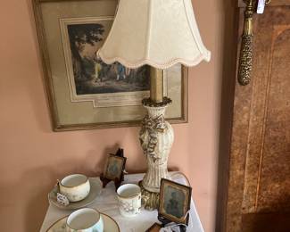 ONE OF A PAIR OF LAMPS. WITH TWO TIN TYPES 