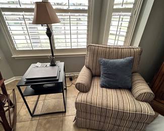 Everything you see in pic. Chair rocks and swivels
