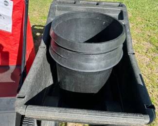 Plastic Wheel Barrels and Large Planting Pots