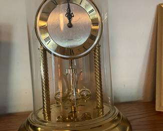 Domed brass table clock