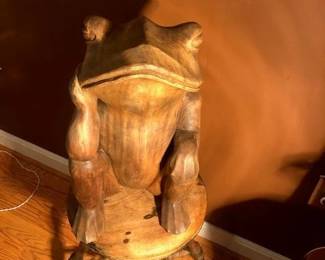 Wooden carved frog sculpture