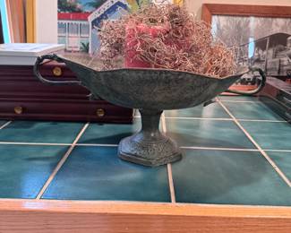 Oval metal floral arrangement base with aged copper finish 6"H x 18"W