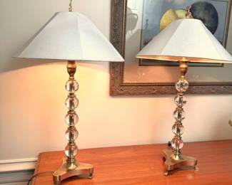 Brass and lucite table lamps with paw feet 26"H
