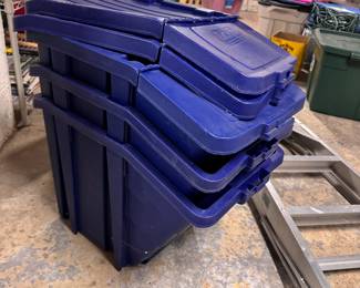 Three stackable Tucker recycling bins with lids