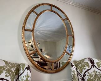 Large oval beveled mirror (similar to Friedman Bros.) with heavy wooden gold frame 48"H x 36"W