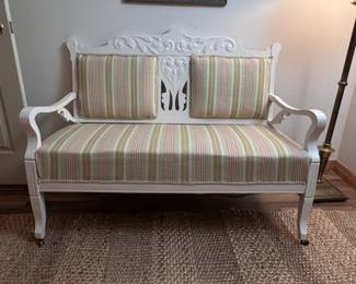 Upgraded Victorian loveseat with off-white painted finish and sage green padded upholstery in the front and velvet on the back 36"H x 46"W x 23"D (This item is downstairs) 
