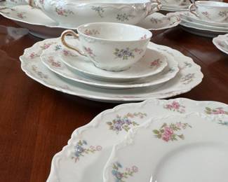 Charles Ahrenfeldt Limoges blue and pink floral china service for 6 with many extra pieces, very minor wear to most pieces