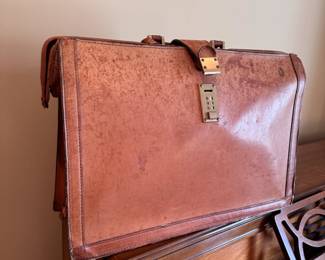 Vintage leather briefcase, hinged opening, lockable, some wear to leather 18"W x 12"H