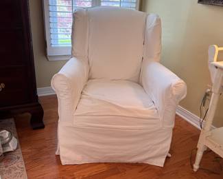 Lee Industries cream armchair that rocks and swivels, the slipcover is offwhite, both show minor spots, very comfortable 40"H x 30"W (in upper level)