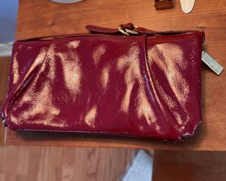 Hobo dark red clutch with zipper wallet inside, nice condition 8"W